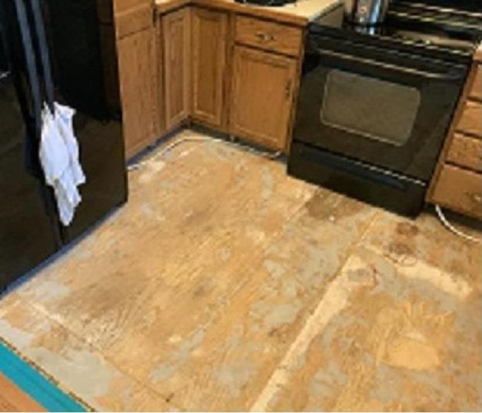 Kitchen subfloor dry, and made usable until new cabinets can be installed