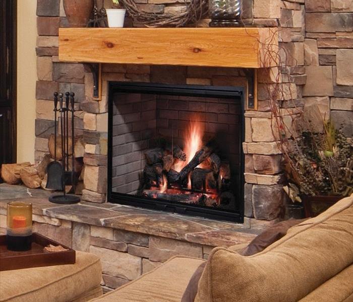 Fireplace with wood logs burning
