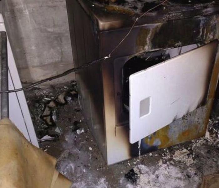 Charred Dryer in Laundry Room