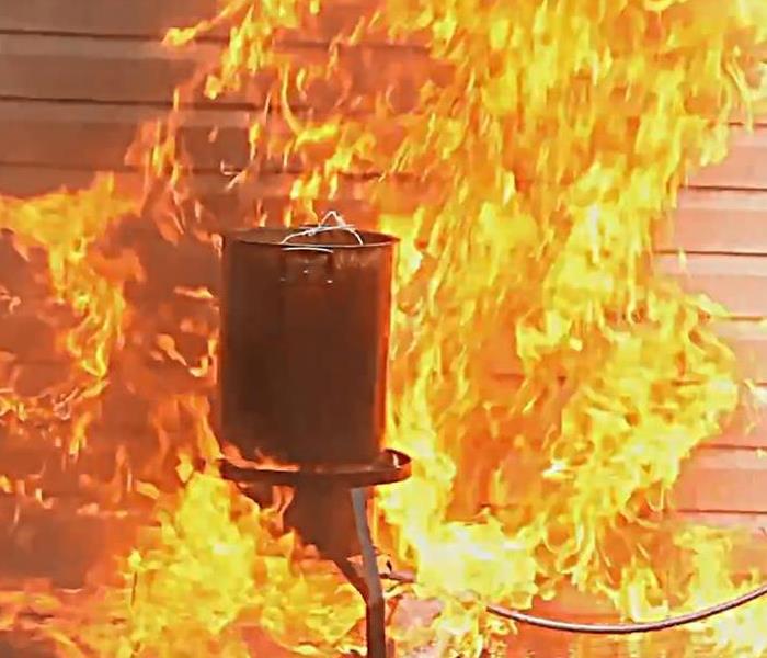 Turkey deep dryer set up near a house burst into flames.