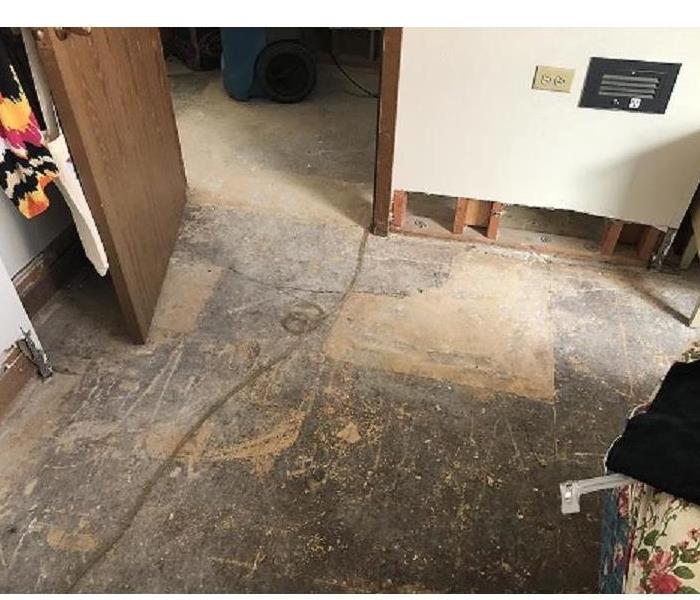Water damage flood cuts near the floor done very sloppy